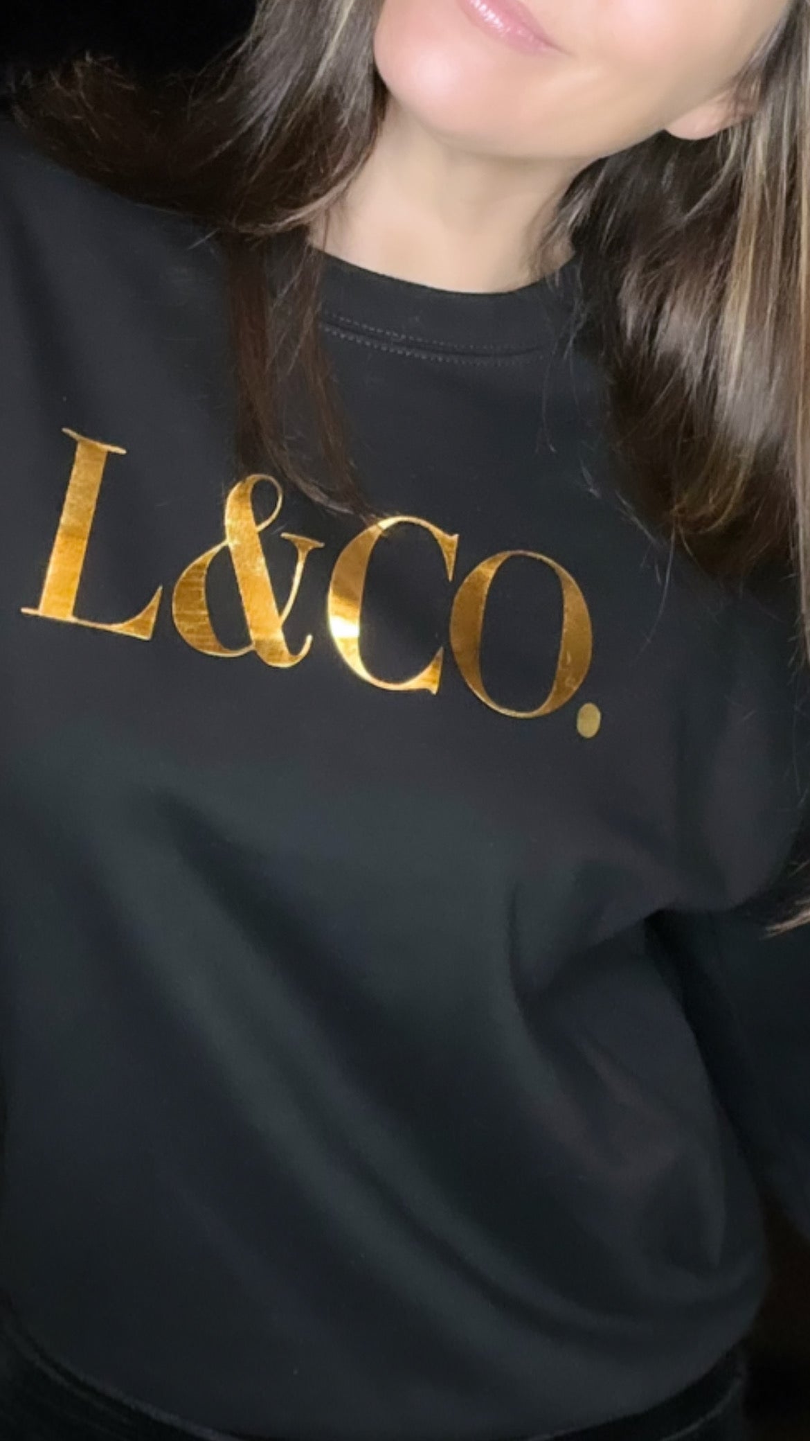 Sudadera LCo negra/dorada