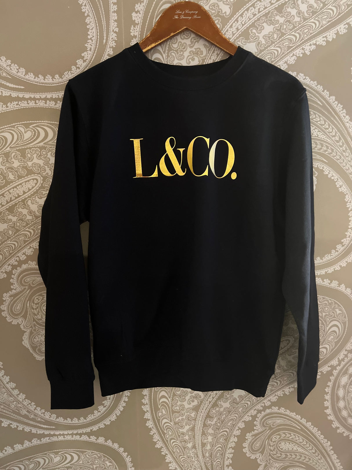 Sudadera LCo negra/dorada