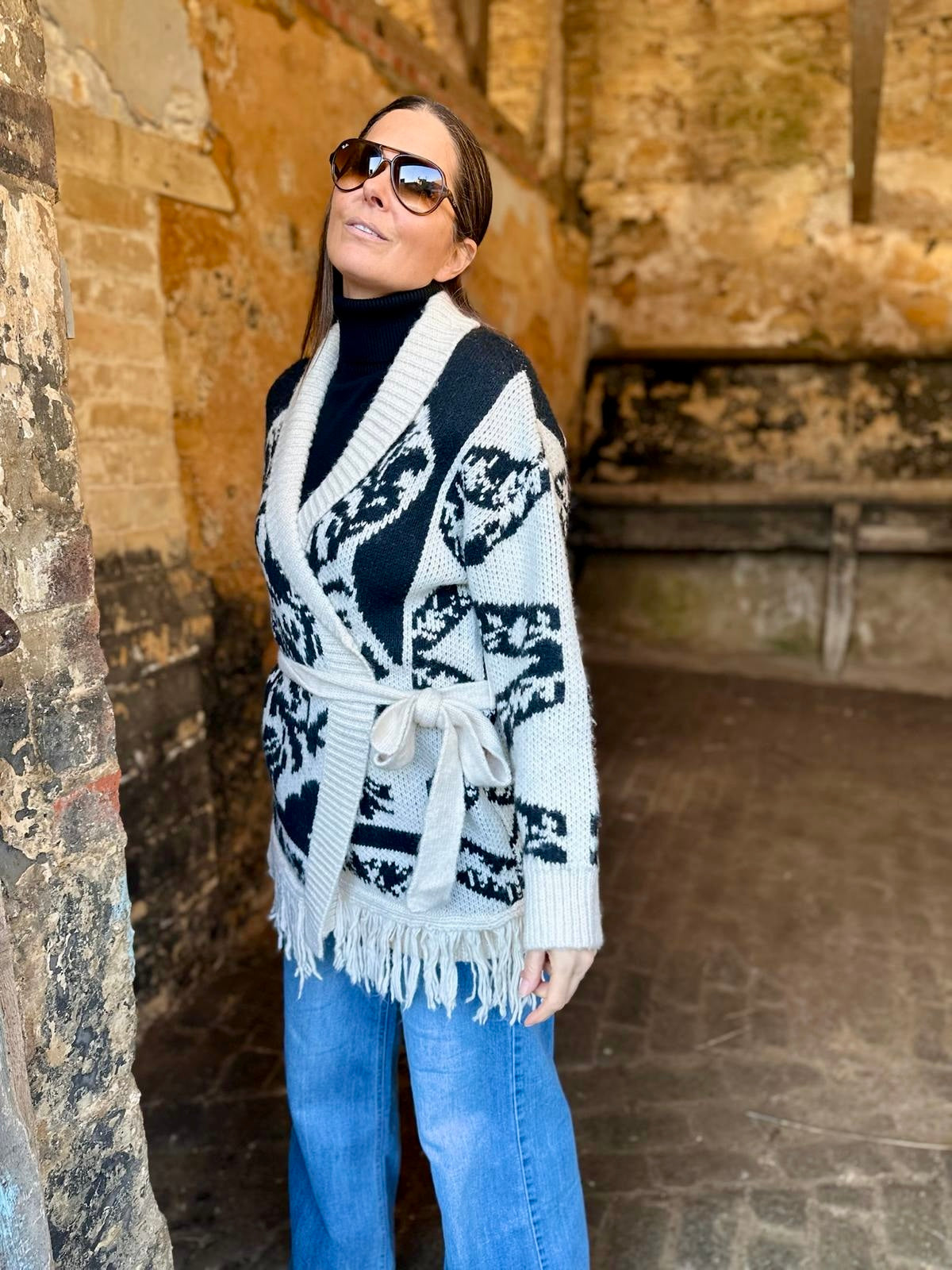 Cárdigan con estampado de coralina y flecos