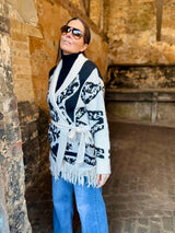 Cárdigan con estampado de coralina y flecos