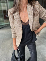 Ese blazer dorado