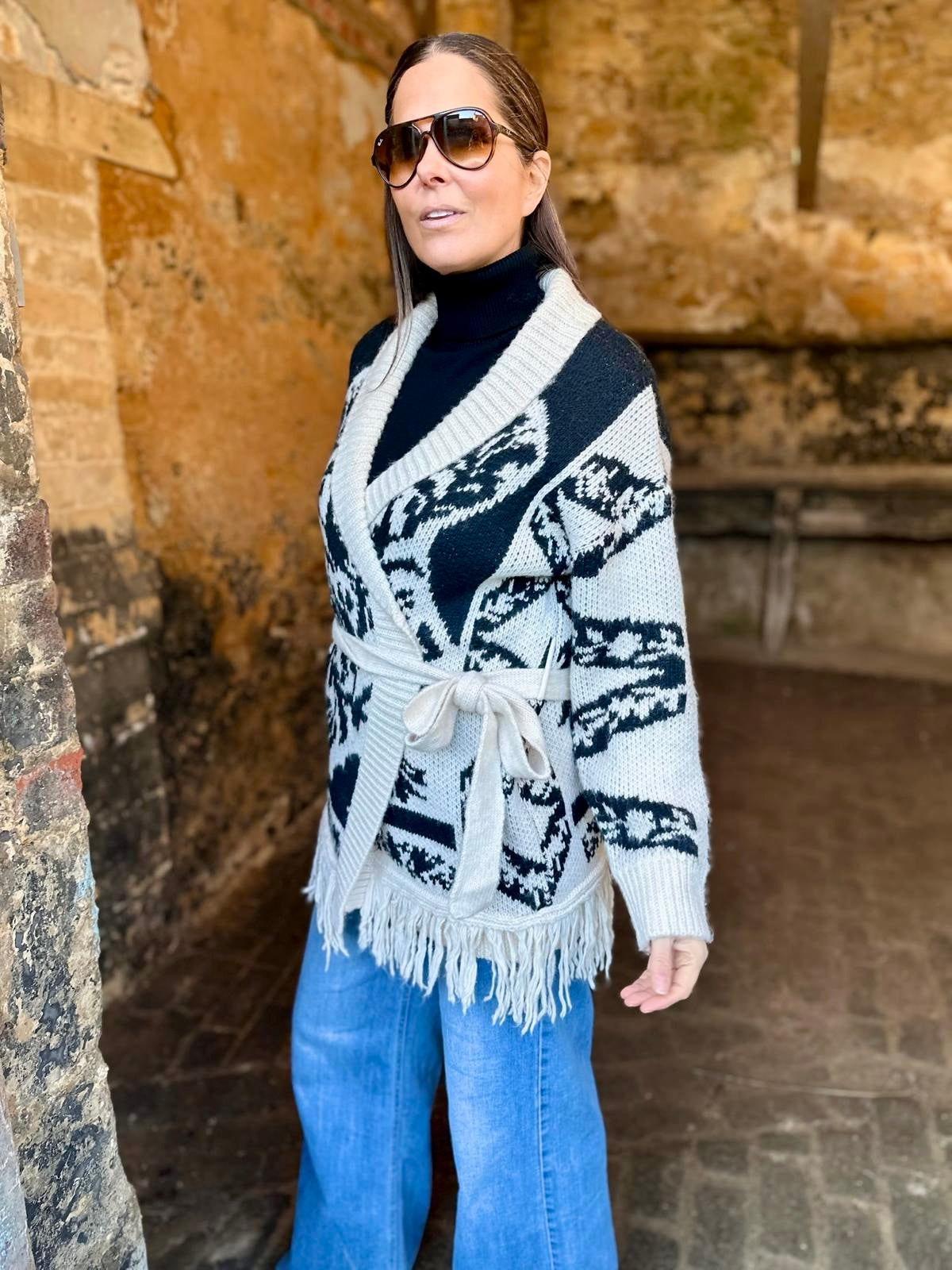 Cárdigan con estampado de coralina y flecos