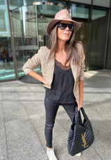 Ese blazer dorado