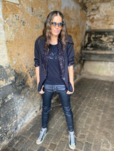 Jean Lux efecto cuero negro