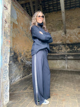 Pantalón Tempest con rayas negras y plateadas